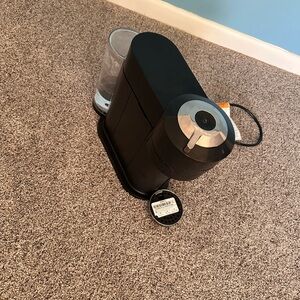 I'm selling my NespressoMachine, a few times only used